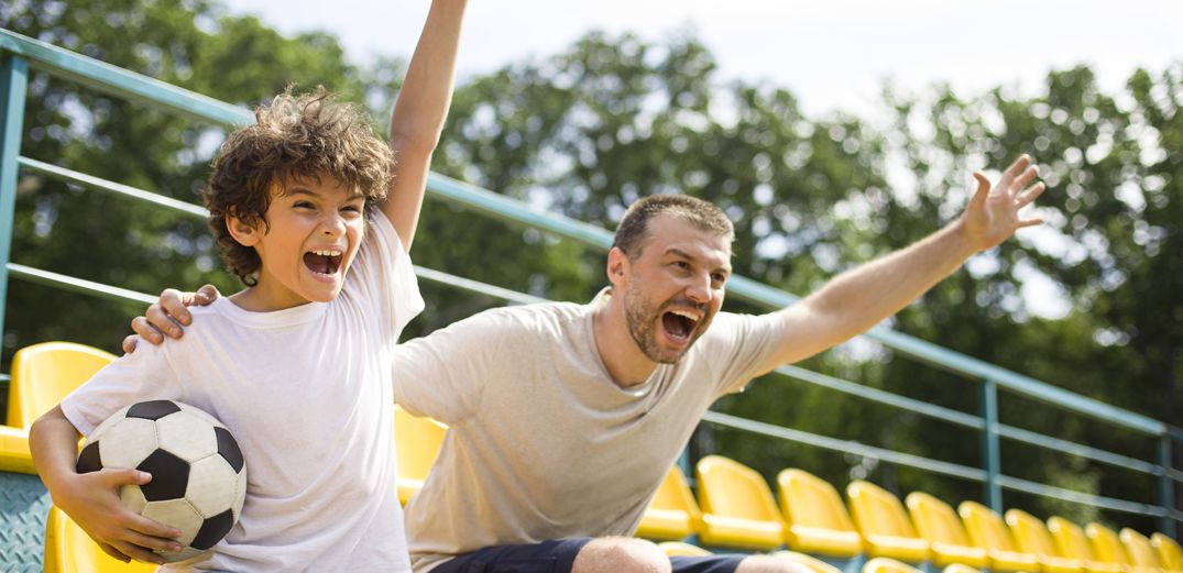 Father and Son at soccer game