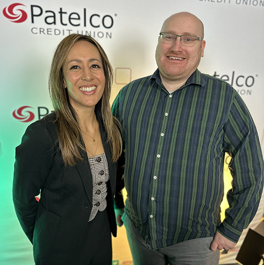 Patelco Employees Michele Enriquez and Charles Brandt at the podcast desk.