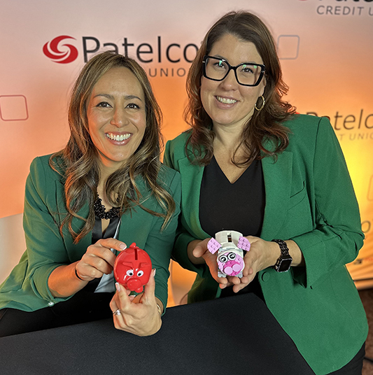 Patelco Employees Michele Enriquez and Kelley Young at the Podcast desk.