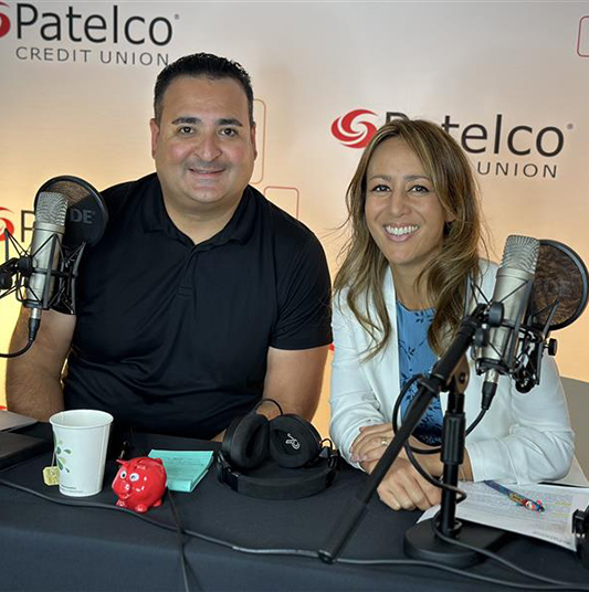 Patelco Employees Michele Enriquez and Mel Murguia at the podcast desk.