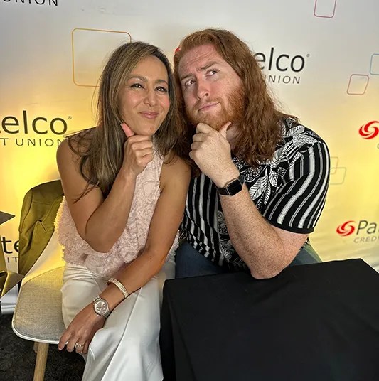 Patelco Employees Michele Enriquez and Andrew Farrell at the podcast desk.