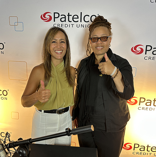 Patelco Employee Michele Enriquez and Avonelle Hanley-Mills, SOLVE Coordinating Manager, Mental Health Association of SF at the podcast desk.